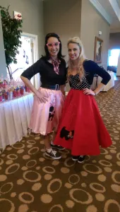 staff members in poodle skirts