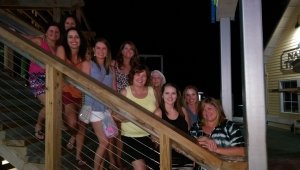 Staff members group photo on stairs